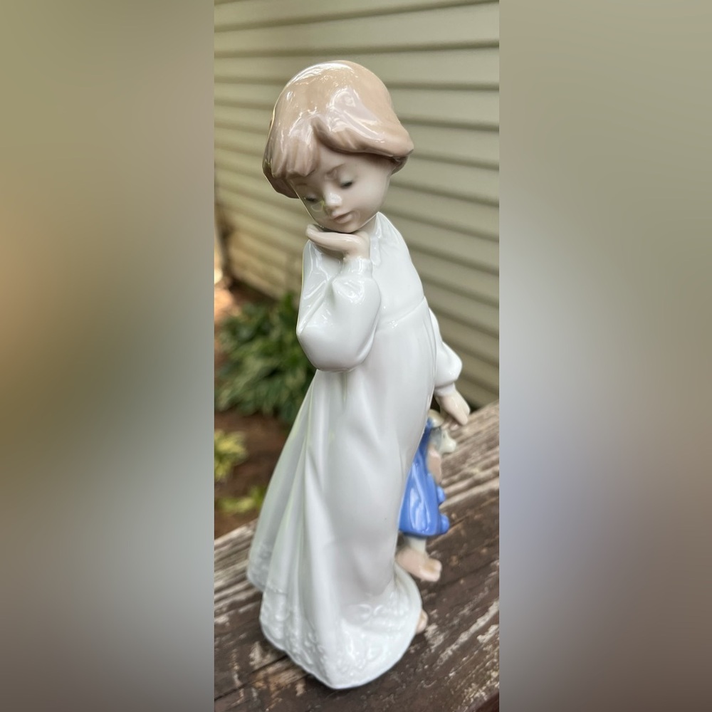 Lladro Girl with ragdoll